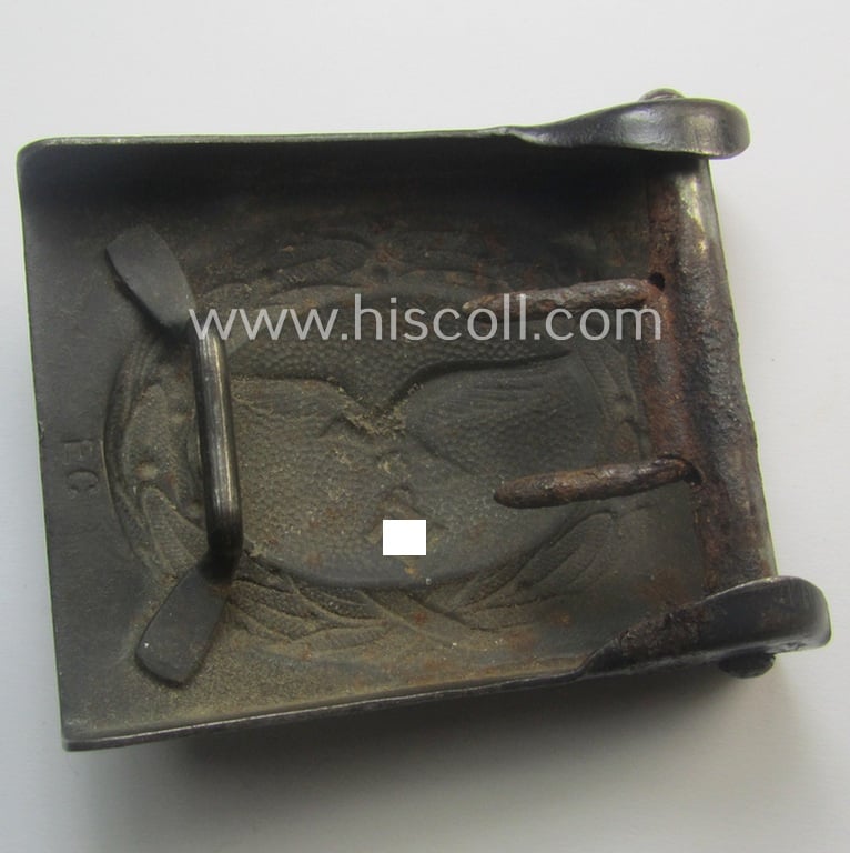 Moderately used example of a WH (Luftwaffe) blue-coloured- and/or typical steel-based belt-buckle, being a clearly maker- (ie. 'EC'-) marked example