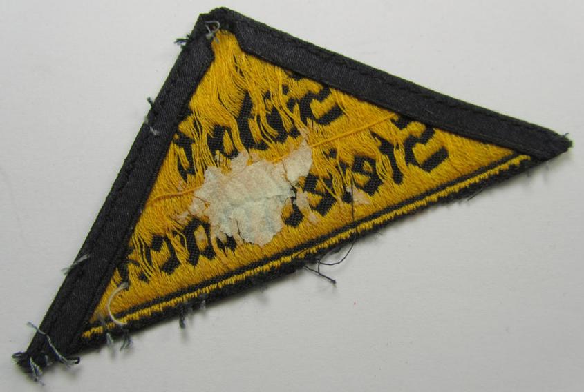 'HJ' ('Hitlerjugend') district-triangle (ie. 'Gebietsdreieck') entitled: 'Südost Steiermark' (being a moderately used- ie. worn  example that shows the remains of its paper-based 'RzM'-etiket on its back)