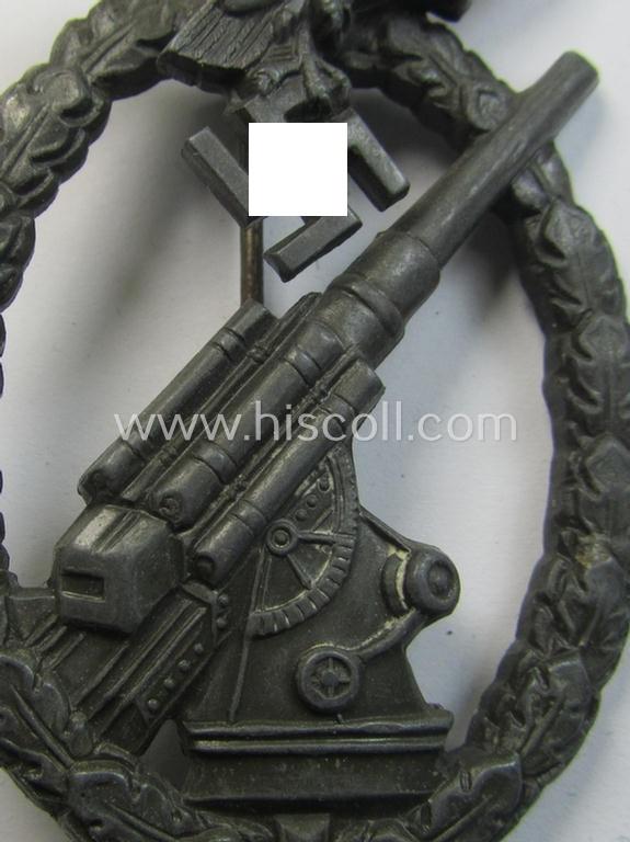 Later-war period- and/or: zinc- (ie. 'Feinzink'-) based- example of a maker- (ie. 'WH'-) marked, WH (Luftwaffe) 'Flakkampfabzeichen' (or: airforce anti-aircraft badge), as was produced by the desirable: 'Wilhelm Hobacher'-company