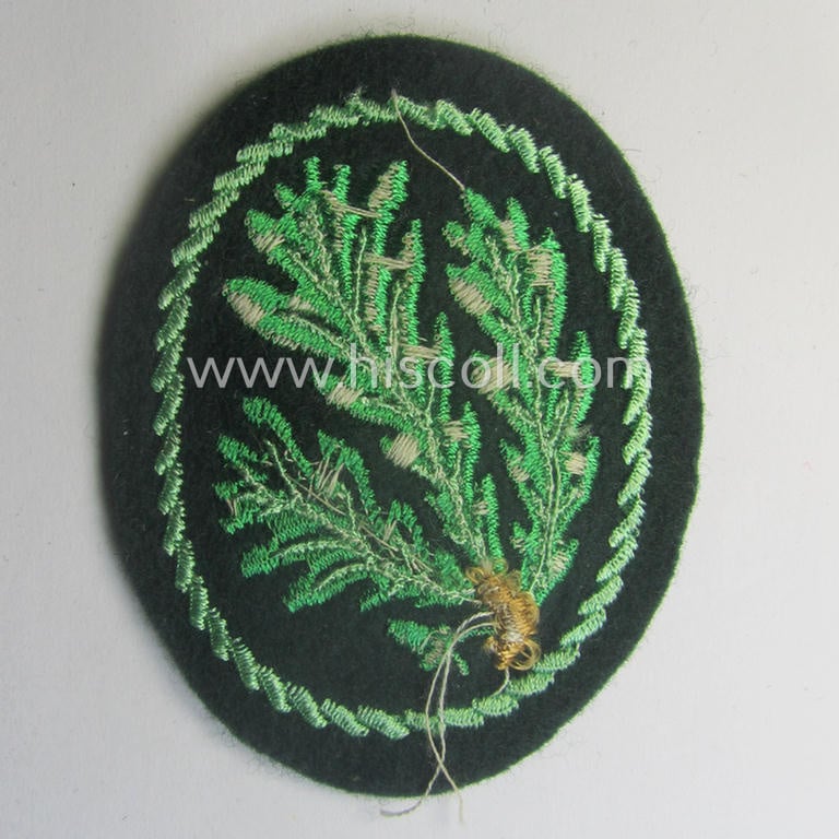 WH (Heeres) so-called: 'Jäger'-armbadge being a neatly machine-embroidered- and/or multi-coloured version as was executed on darker-green-coloured wool