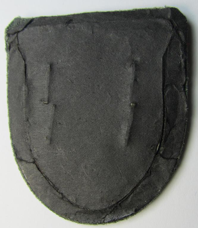 Attractive - albeit minimally rust-stained - WH (Heeres ie. Waffen-SS) 'Krim'-campaign-shield (as was produced by a by me unidentified maker) and that comes in a presumably issued - albeit 'virtually mint', condition