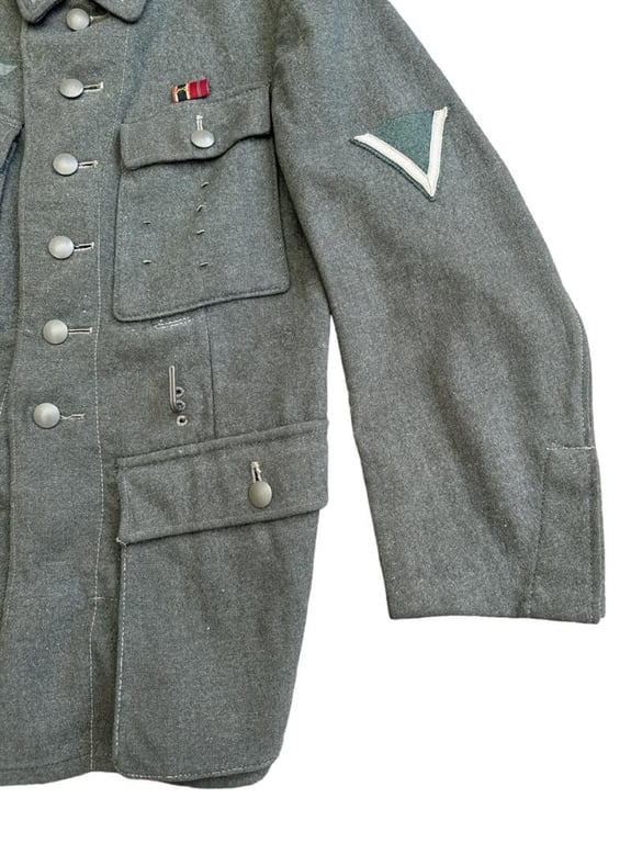 Wehrmacht Heer M43 EM field tunic With Original Applied Insignia