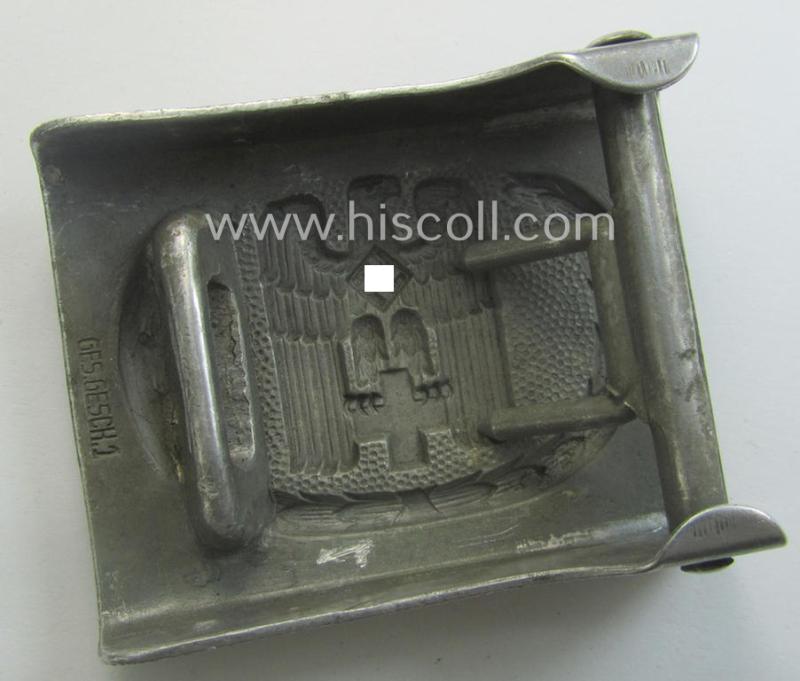 Aluminium-based, so-called: DRK (ie. 'Deutsches Rotes Kreuz'), enlisted-mens'- (ie. NCO-) type belt-buckle being a clearly maker- (ie. 'Ges.Gesch. 1'-) marked example