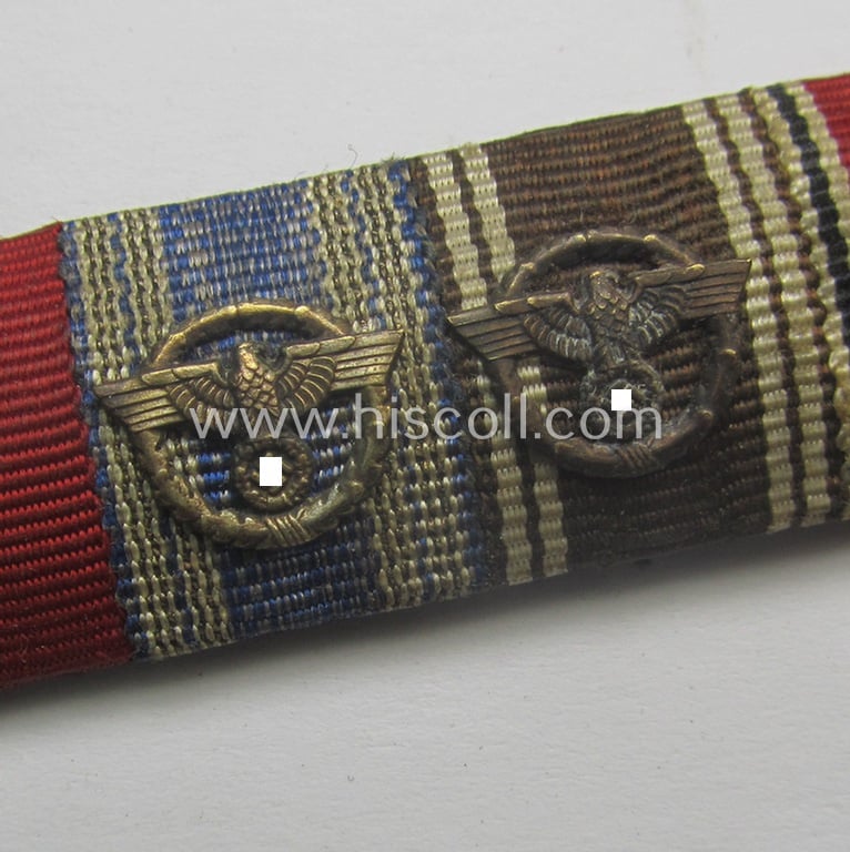 Unusually encountered, 5-pieced, N.S.D.A.P-related ribbon-bar (ie. 'Feld- o. Bandspange') resp. depicting the ribbons for an: 'EKII. Kl.', an: 'Ost'-medal, two: 'N.S.D.A.P.-DA der 2. u. 3. Stf.' and an Austrian 'Anschluss'-medal '13. März 1938'