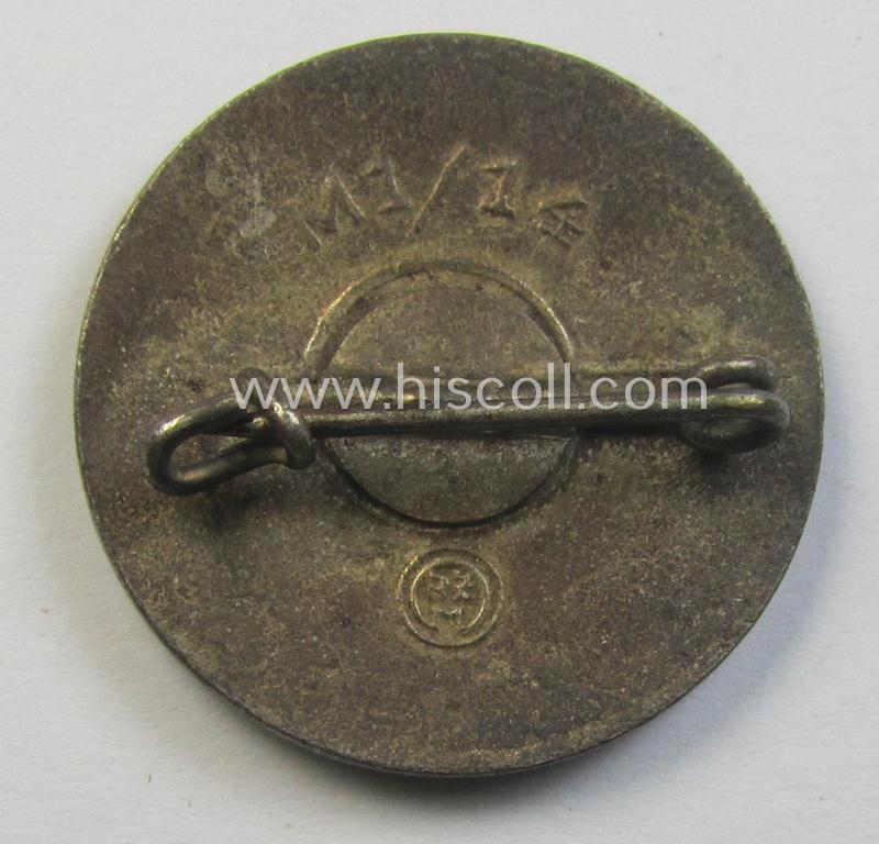 Attractive - bright-red-coloured and nicely preserved! - 'N.S.D.A.P.'-membership-pin- ie. party-badge (or: 'Parteiabzeichen') which is maker-marked on its back with the makers'-designation: 'RzM' and/or: 'M1/14'