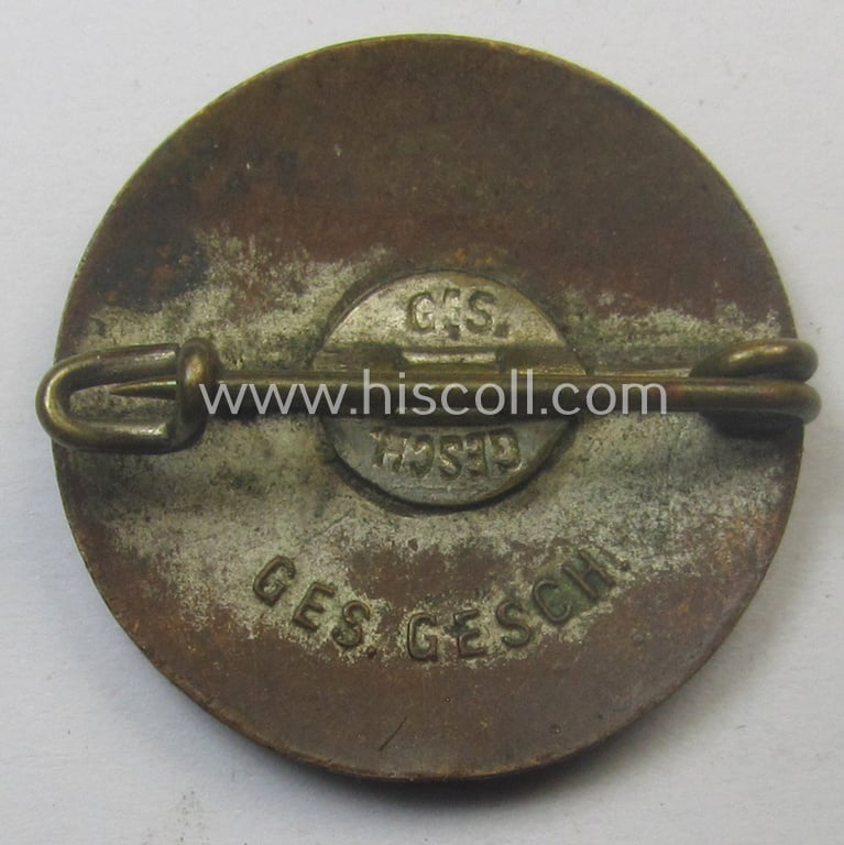 Early-period - and scarcely found! - 'N.S.D.A.P. - Parteiabzeichen' that is void of a makers'-designation but that shows a (double) ' ‘Ges.Gesch.'-patent-pending-designation