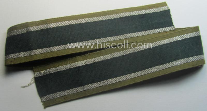 'BeVo'-like cuff-title (ie. 'Ärmelstreifen') entitled: 'Afrikakorps' being a presumably issued but simply never worn example that comes in an overall very nice- (ie. non-shortened- and never tunic-attached-), condition