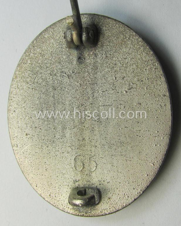 Attractive - and moderately used- and worn! - example of a maker- (ie. '65'-) marked example of a silver-class wound-badge (or: 'Verwundeten-Abzeichen in Silber') as was produced by the 'Hersteller' ie. maker: 'Klein u. Quenzer'