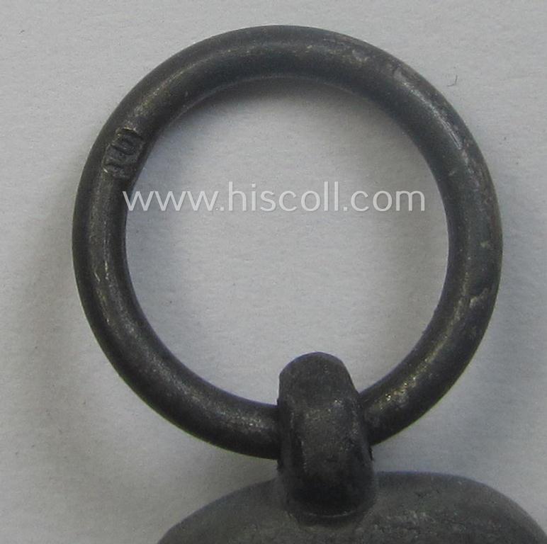 Medal-set: 'Winterschlacht im Osten 1941/42' as produced by the: 'Förster & Barth'-company being a clearly maker- (ie. '10'-marked) specimen that came stored in its original 'Zellstoff'-based pouch of issue as found