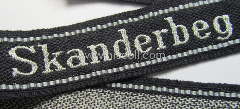 Superb - and rarely encountered! - example of a Waffen-SS, 'semi-BeVo'-pattern, EM- (ie. NCO-) type cuff-title (ie. 'Ärmelstreifen') as was intended for a member of the: '21. Waffen-Grenadier-Division der SS' “Skanderbeg” (ie. 'albanische Nr....
