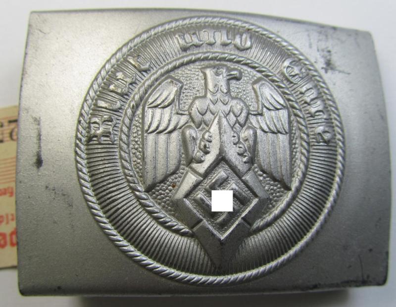 Stunning - and actually rarely encountered! - 'HJ- o. Hitlerjugend'-belt-buckle being a clearly maker- (ie. 'RzM M4/22'-) marked example (with period-attached 'RZM'-etiket!) that comes in an overall wonderful- (ie. 'virtually mint'!-), condit...