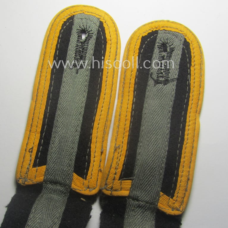 Pair of fully matching, 'M44'- ie. 'simplified'-pattern, Waffen-SS NCO-type shoulderstraps as piped in the golden-yellow-coloured branchcolour for usage by an 'Unterscharführer' who served within the: 'Waffen-SS Kavallerie o. Aufklärungs-Trpn.'