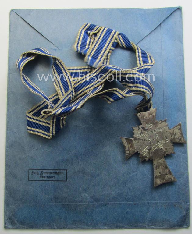 'Ehrenkreuz der deutschen Mutter - zweite Stufe' (or: silver-class mothers'-cross) that came mounted onto its long-sized ribbon and that came stored in its period pouch by the (unusual!) maker: 'Fritz Zimmermann - Stuttgart'