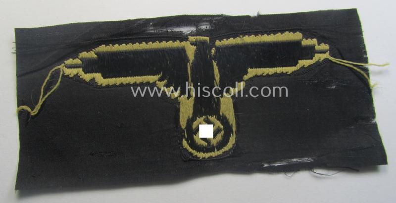 Partly damaged, 'SS' (ie. 'Waffen-SS') 'BeVo'-woven, EM- (ie. NCO-pattern) tropical-styled arm-eagle (ie. 'Tropen-Ärmeladler für Mannschaften u. Unterführer der Waffen-SS')
