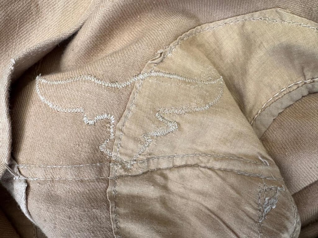 Luftwaffe 4 pocket tropical tunic with insignia, near mint condition