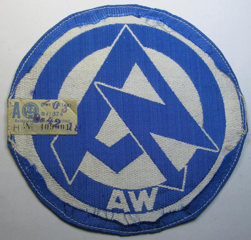 Attractive - and scarcely encountered! - SA (ie. 'Sturmabteilungen'), 'BeVo'-woven sport-shirt insignia still showing its period-attached 'RzM'-etiket as was intended for an SA-member who served within the: 'Gruppe Wartheland' (WA)
