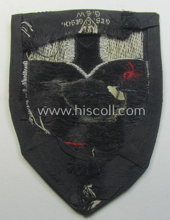 Officers'-pattern so-called: RAD (ie. 'Reichsarbeitsdienst') sleeve-badge (or: 'Dienststellenabzeichen') bearing the specialist- (ie. unit-) designation that reads: '104/5'