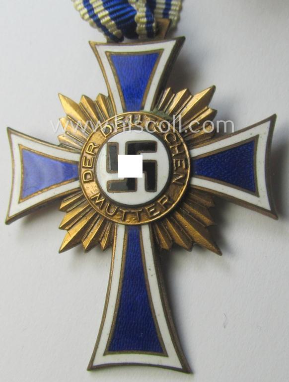 'Ehrenkreuz der deutschen Mutter - dritte Stufe' (or: bronze-class mothers'-cross) that came mounted onto its long-sized ribbon and that came stored in its period pouch (by the maker: 'Jakob Bengel - Oberstein')