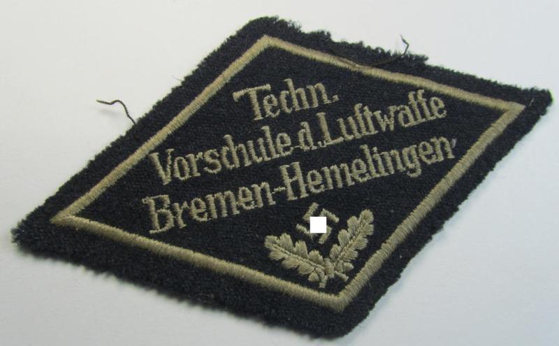 Attractive - and truly rarely encountered! - HJ- (ie. 'Flieger-HJ') specialist-armbadge (or: 'Schulabzeichen') depicting the text: 'Techn. Vorschule d. Luftwaffe - Bremen-Hemelingen'
