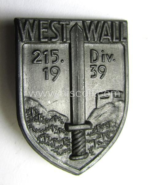 Attractive - and actually quite scarcely encountered! - WH (Heeres) so-called: 'Truppen-Traditionsabzeichen des 215. Infanterie Division' as executed in greyish-coloured zinc-based metal (ie. 'Feinzink')