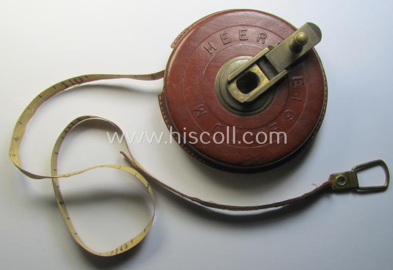 Attractive, 'high-quality'-produced, WH (Heeres) measuring-device (ie. 'tape-ruler') being a complete and fully functional example that is neatly marked: 'Heereseigentum' and that is clearly dated: 'H 1936'