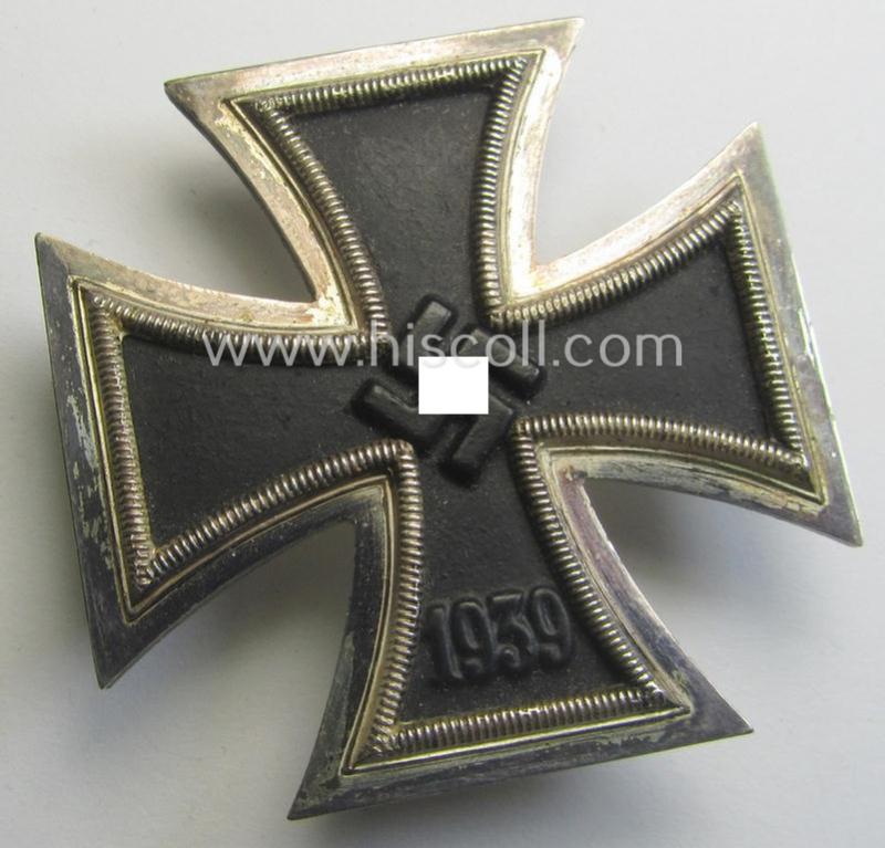 'EK 1. Klasse' (or: Iron Cross 1st class) as executed in the scarcely seen so-called: 'screw-back'-pattern being a non-marked example that comes stored in its accompanying etui
