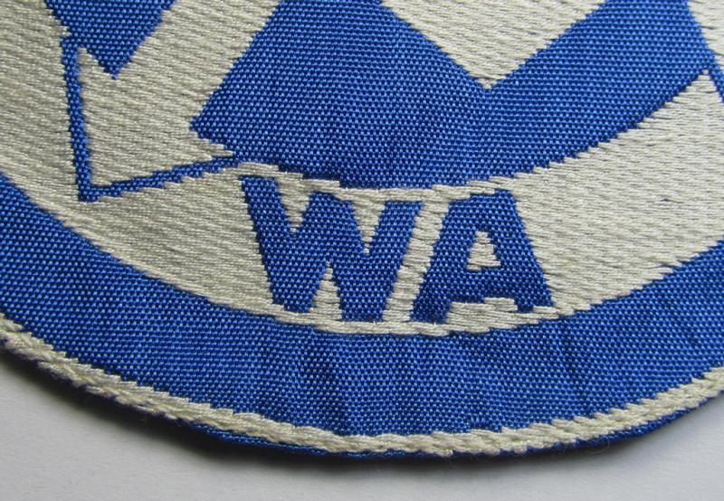 Attractive - and scarcely encountered! - SA (ie. 'Sturmabteilungen'), 'BeVo'-woven sport-shirt insignia still showing its period-attached 'RzM'-etiket as was intended for an SA-member who served within the: 'Gruppe Wartheland' (WA)