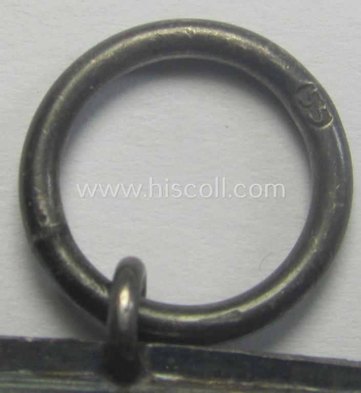 'Eisernes Kreuz 2. Kl.' being a maker- (ie. '55'-) marked example that comes stored in its period 'Zellstoff'-based pouch by the: 'J.E. Hammer & Söhne'-company as was based in the town of Geringswalde