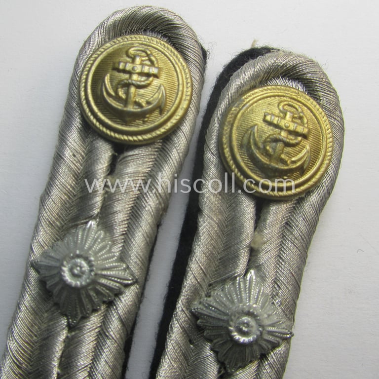 Moderately used pair of WH (Kriegsmarine) officers'-type shoulderboards as intended for a medium-ranked, administrative-official (ie. officer) having the rank of a: 'Hauptmann' (ie.: 'Beambter des mittleren Dienstes')