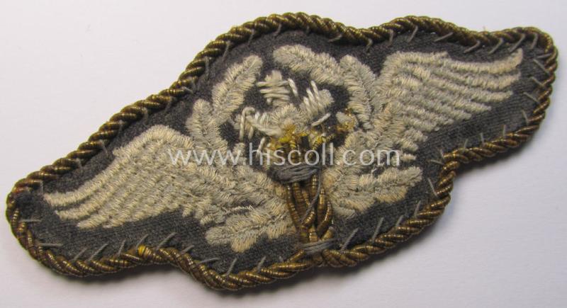 Attractive - and scarcely seen! - example of a WH (Luftwaffe) machine-embroidered, so-called: trade- ie. special-career-patch (ie. 'Tätigkeitsabzeichen') having a golden-yellow-coloured 'Goldkordel' attached as was intended for: 'Flugzeugpersona...