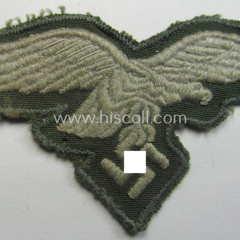 WH (Luftwaffe) machine-embroidered breasteagle, as was specifically intended for usage on the paratrooper-jumpsmocks (ie. 'FJ-Knochensäcke')