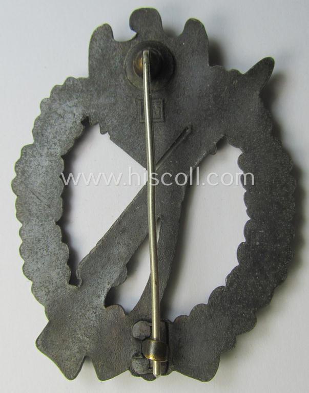 'Infanterie Sturmabzeichen in Bronze' being a maker- (ie. 'JFS'-) marked, 'solid-back' example by the desirable maker: 'Josef Feix u. Söhne' as was executed in golden-bronze-coloured, zinc-based metal