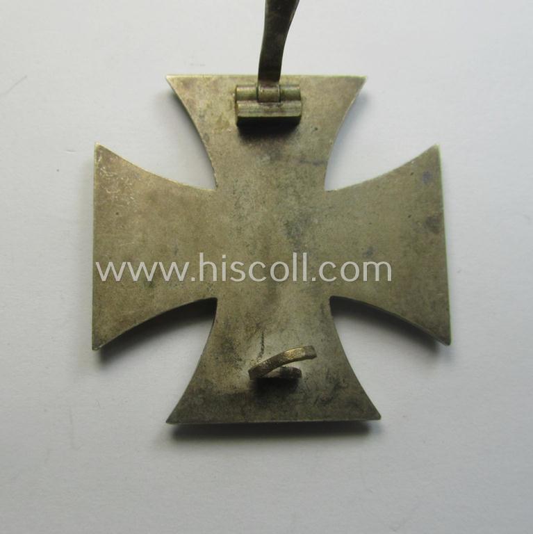 'Eisernes Kreuz 1. Kl.' (or: Iron Cross 1st class) being a typical maker- (ie. '15'-) marked example that as was produced by the Austrian maker (ie. 'Hersteller'): 'Friedrich Orth' and that comes as issued and worn