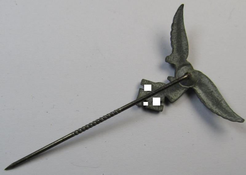 Silverish-grey-toned lapel-pin (ie. 'Zivilabzeichen') to be worn on the civil attire as was intended for usage by the various staff-members of the 'Luftwaffe' (depicting an early-pattern- ie. 'down-tailed'-eagle)