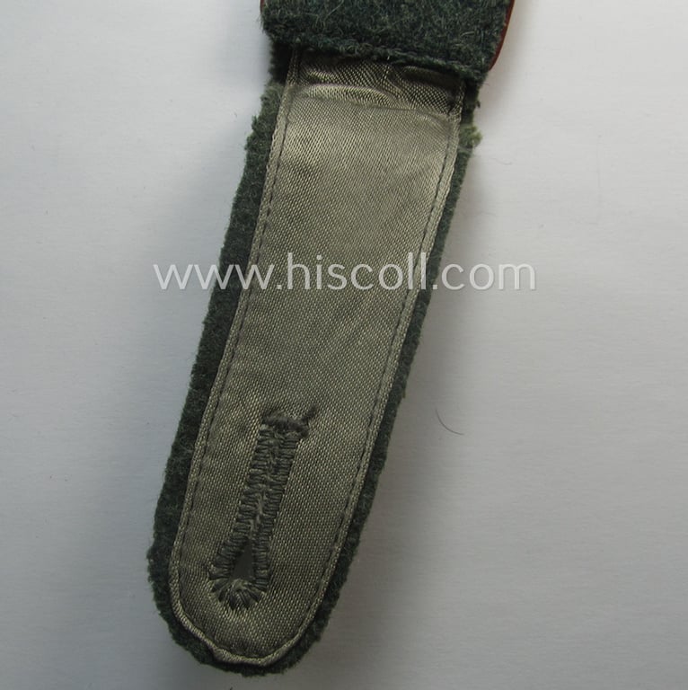 Single, WH (Heeres) EM-type (ie. 'M41 o. M43'-pattern) shoulderstrap: 'Soldat der (Nebel)Werfer-Trpn.'
