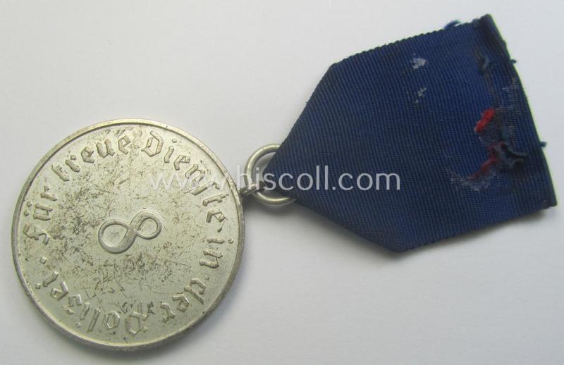 Bright-silver-toned so-called: 'Polizei-Dienstauszeichnung 3. Stufe' (or: police loyal-service medal 3rd class) that comes mounted onto its period ribbon (ie. 'Bandabschnitt')