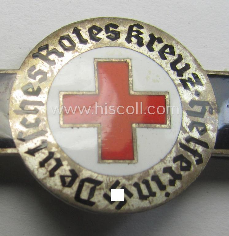 Neat - and scarcely encountered! - example of a DRK (ie. 'Deutsches Rotes Kreuz') nurses'-badge (ie. clasp or 'Spange') as was intended for a: 'Helferin' (being a non-maker-marked example bearing a: 'Ges.Gesch.'-patent-pending-designation)