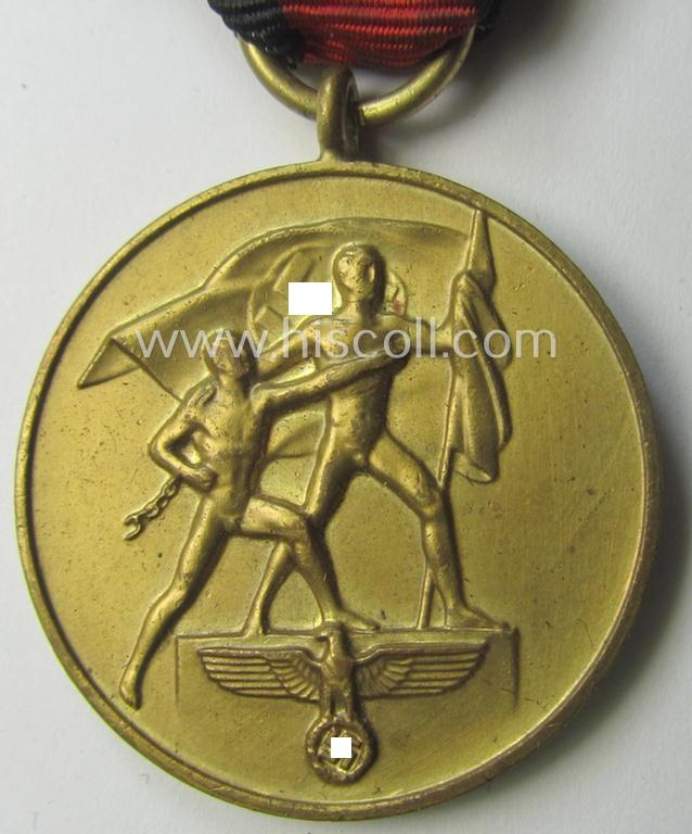 WH Czech-occupation- (ie. 'Anschluss'-) medal: '1. Oktober 1938' being a neat (albeit minimally tarnished) example that comes mounted onto its period ribbon and that shows a firmly (and period!) attached 'Prager Burg-Spange'