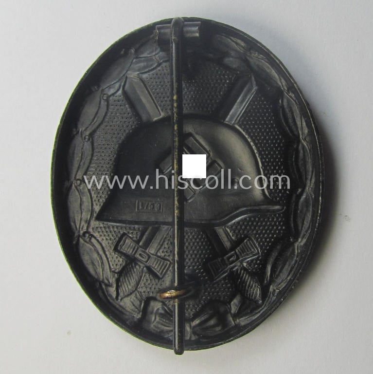 'Verwundeten-Abzeichen in Schwarz' being a maker- (ie. 'L/53'-) marked example by the company: 'Hymmen & Co.' and that came stored in its typical 'LDO'-type etui (ie. two-pieced-box)