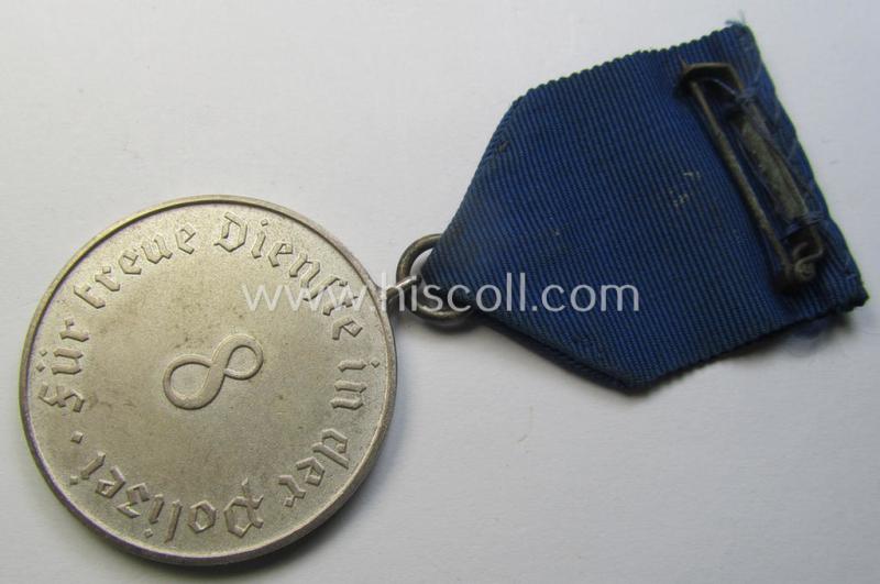 Attractive, bright-silver-toned so-called: 'Polizei-Dienstauszeichnung der 3. Stufe' (or: police loyal service medal of the 3rd class as was awarded for 8 years of service) that comes mounted on its period ribbon (ie. 'Bandabschnitt') as issued