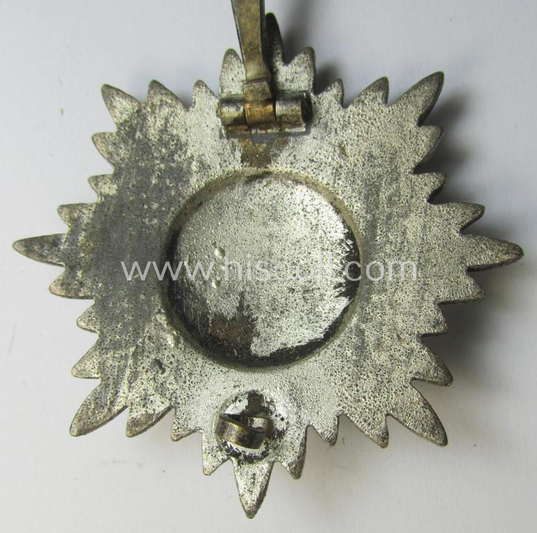 Attractive, WH-related, so-called: 'Verdienstauszeichnung o. Steckkreuz für Angehörige der Ostvölker, 1. Kl. in Silber ohne Schwertern' being a non-maker-marked example that comes in an overall nice condition