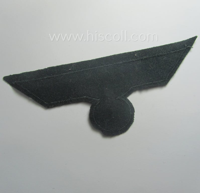 WH (Heeres) breast-eagle as executed in 'BeVo'-type, 'flat-wire'-weave-pattern and pre-mounted on darker-green-coloured wool as was intended for usage by soldiers (ie. NCOs) on their dress-tunics (ie. 'Waffenröcke')