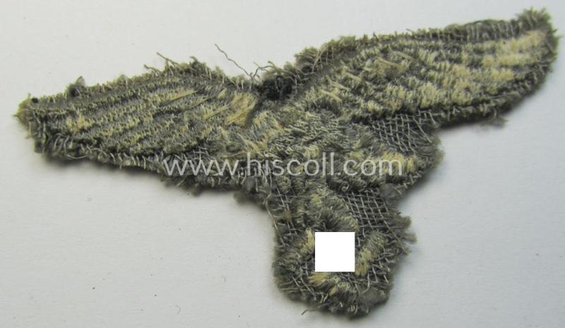 Neat, 'variant'-pattern, WH (Luftwaffe) EM- (ie. eventually NCO-) type side-cap eagle (being a truly used and/or cap-removed example as executed in typical machine-embroidered-pattern onto an unusally seen 'linnen-based' background)