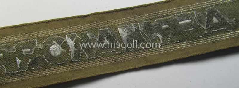 Attractive, 'BeVo'-like cuff-title (ie. 'Ärmelstreifen') entitled: 'Afrikakorps' being a with certainty issued and truly worn example that comes in an overall nice- (ie. minimally shortened- and/or once tunic-attached-), condition