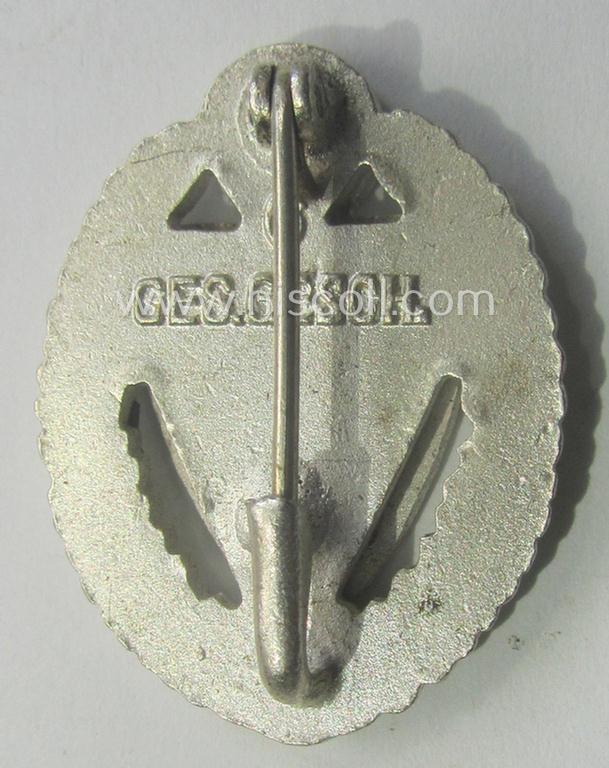 Honorary-membership-lapel-pin (aka: 'Silberne Ehrennadel für 25 Jahre Mitgliedschaft im Nationalsocialistischer Reichskriegerbund' (ie. 'N.S.R.K.B.') being a maker- (ie. '6'-) marked example that also bears a: 'Ges.Gesch.'-designation