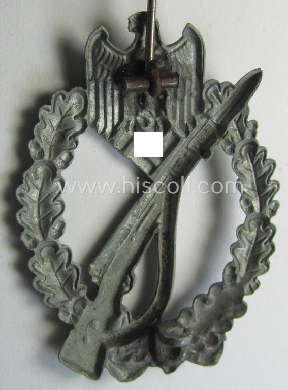 'Infanterie Sturmabzeichen in Silber', being an unmarked (and/or very converse- ie. vaulted-) 'hollow-back' example by the maker: 'Friedrich Linden' (ie. 'F.L.L.') as was executed in silver-coloured, zinc-based metal (ie. 'Feinzink')