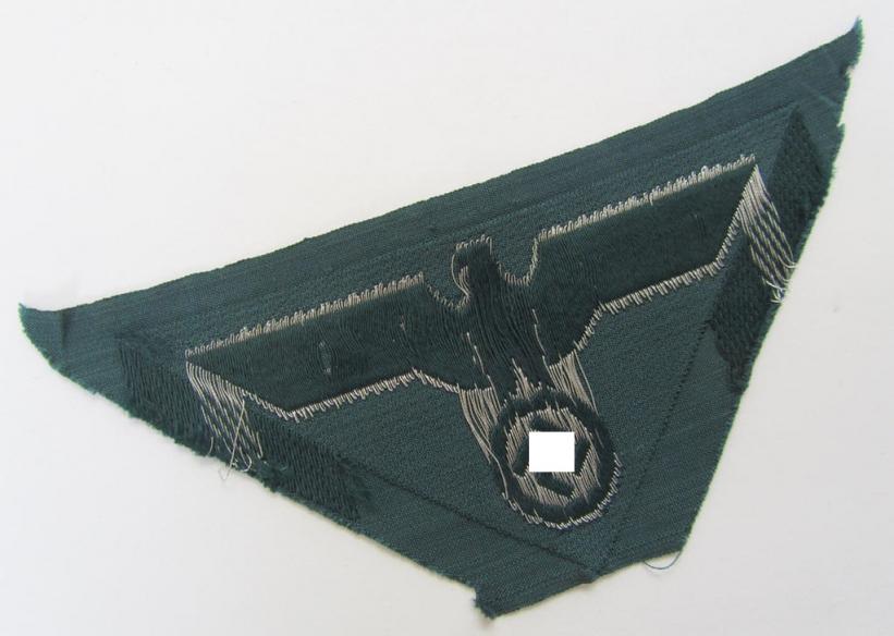 Attractive - and rarely encountered! - later-war-period-, WH (Heeres) ie. 'officers'-type-, so-called: 'M44'-pattern-, trapezoid-shaped breasteagle, being a silver-coloured example as executed in neat 'BeVo'-weave, flat-wire-pattern