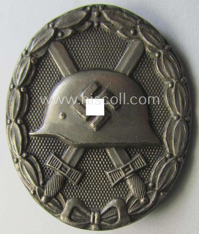 'Variant'-pattern, silver-class wound-badge (or: 'Verwundeten Abzeichen in Silber') being a maker- (ie. 'L22'-) marked example by the: 'Glaser u. Söhne'-company