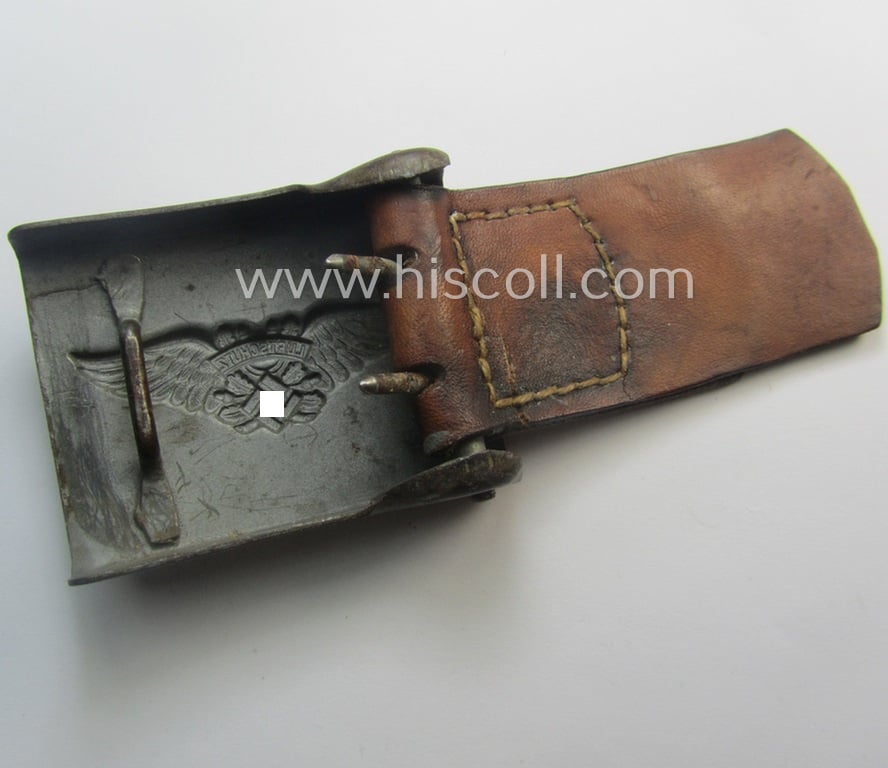RLB (ie. 'Reichsluftschutz-Bund'), steel-based EM- (ie. NCO-) type belt-buckle (of the third- and final pattern) being a non-maker-marked example that comes mounted onto its maker-marked and/or: '1942'-dated tab