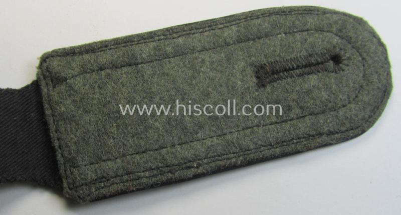Neat - albeit regrettably single - Waffen-SS, NCO-type shoulderstrap as piped in the black-coloured branchcolour as was intended for usage by an NCO (ie. 'SS-Unterscharführer') who served within the: 'Waffen-SS Pionier-Truppen'
